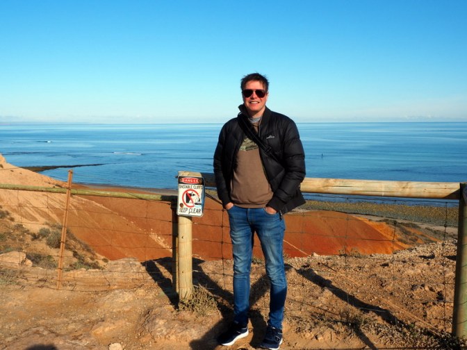 Can you see the paddle boarder?